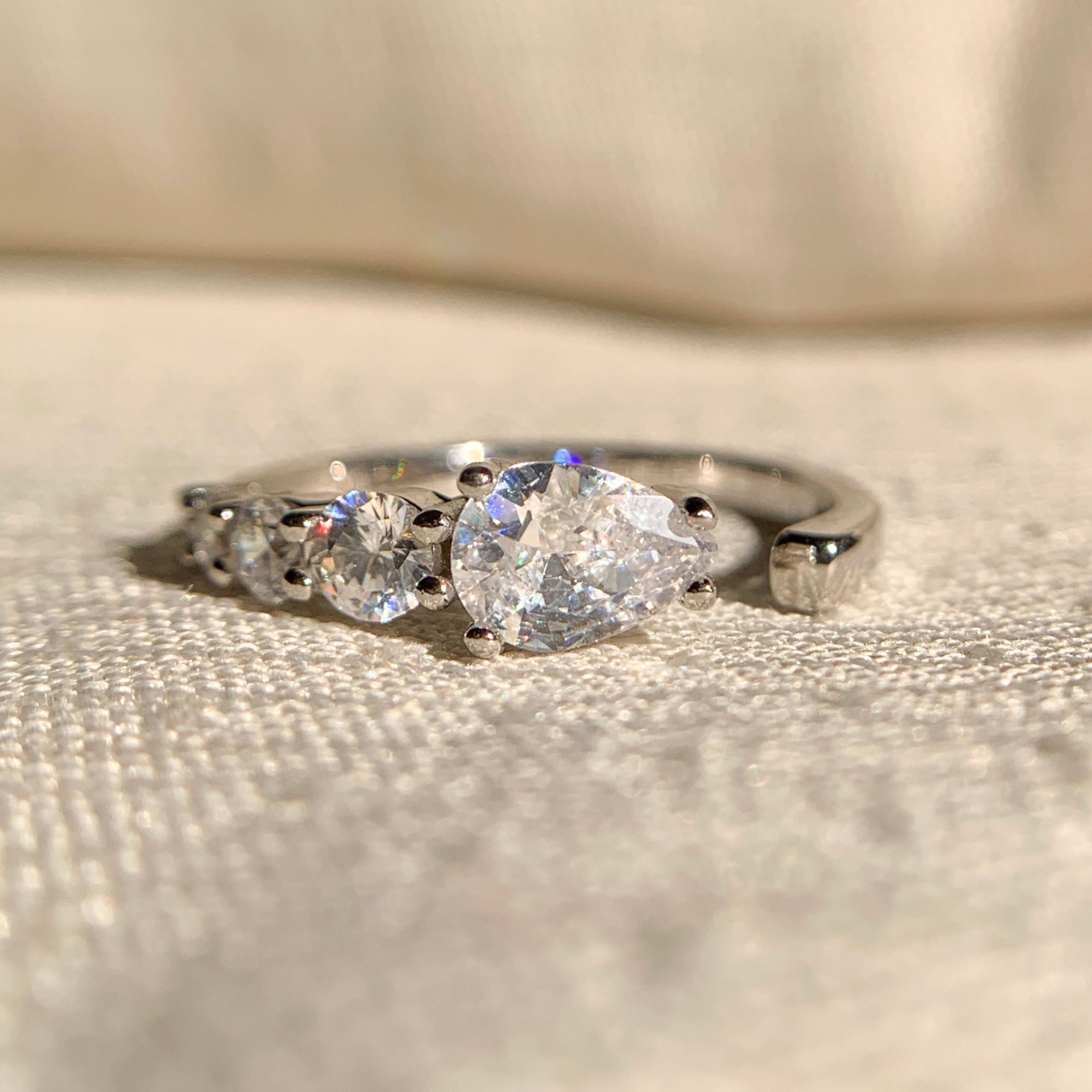 Pear and round lab grown diamond open cuff ring in sterling silver